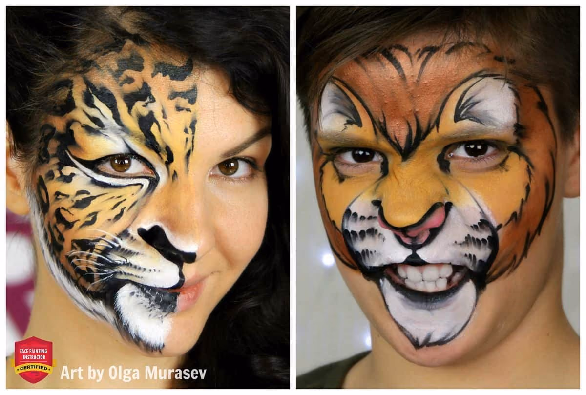 a woman with a leopard face paint on one half of her face and a boy with a lion face paint design