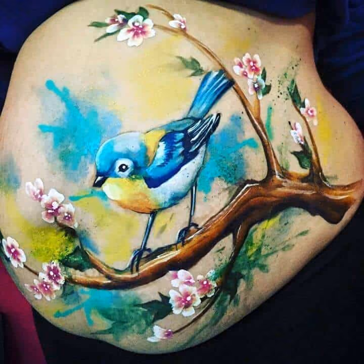 Asymmetrical placement in belly painting