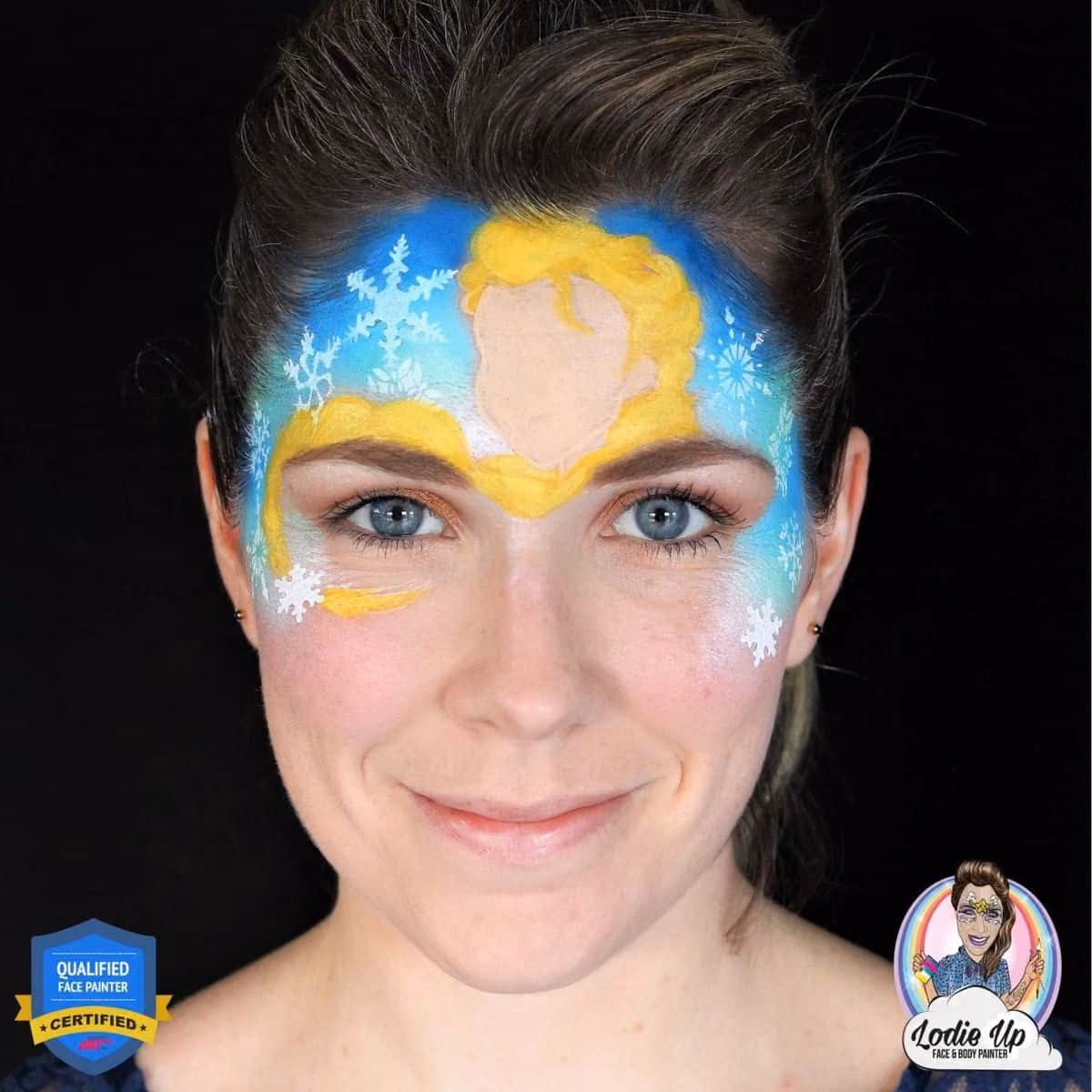 a woman with a elsa face paint design. elsas face is not detailed.