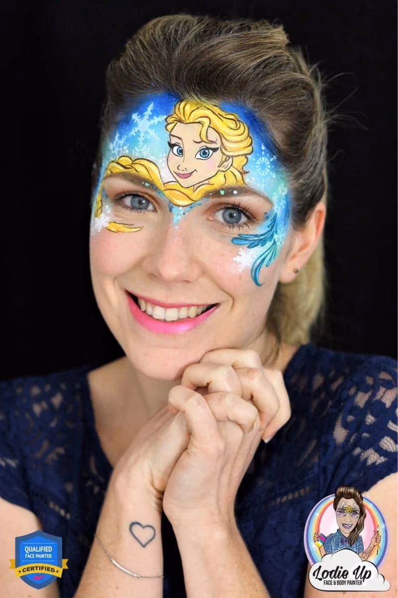 a woman with a compleated elsa face paint design