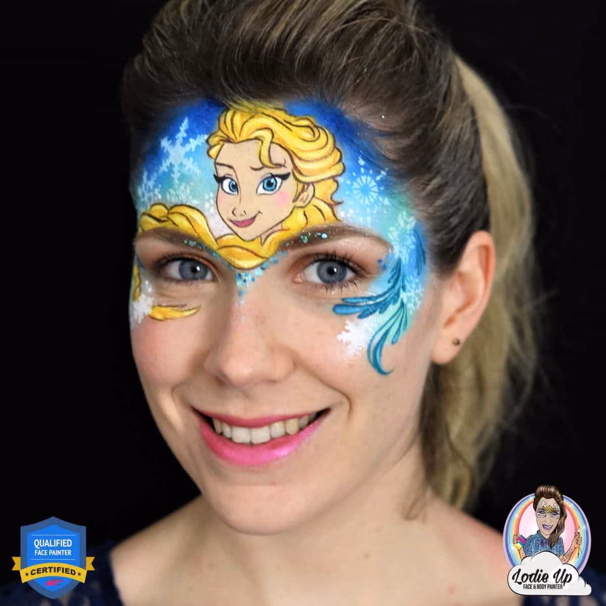 a woman with a finished elsa face paint design