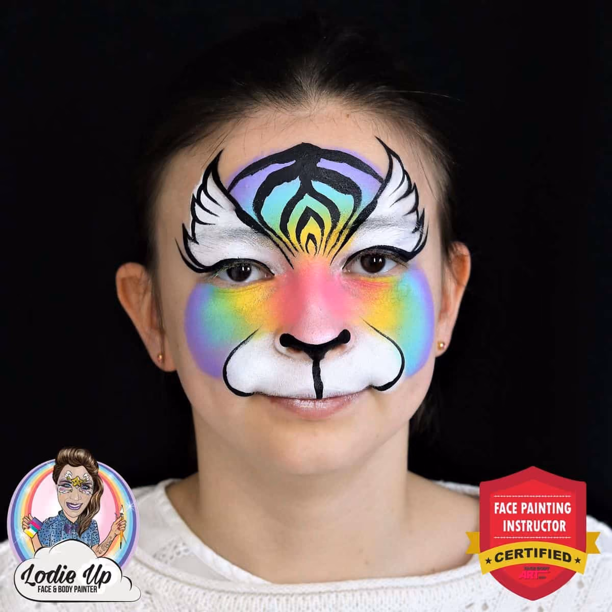 an image of a girl wearing an uncompleated colorful tiger face paint design