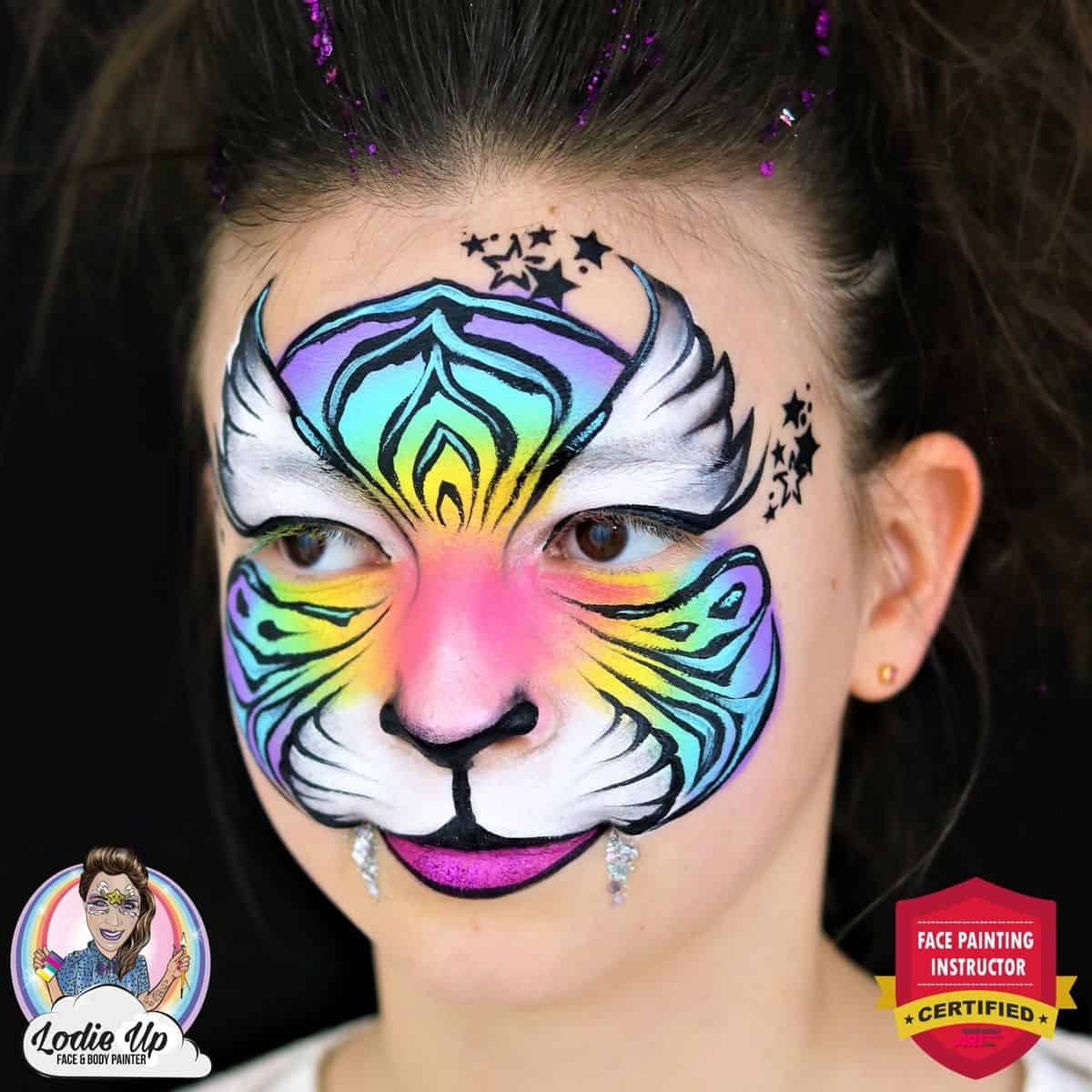 a girl looking to the side wearing a colorful tiger face paint design