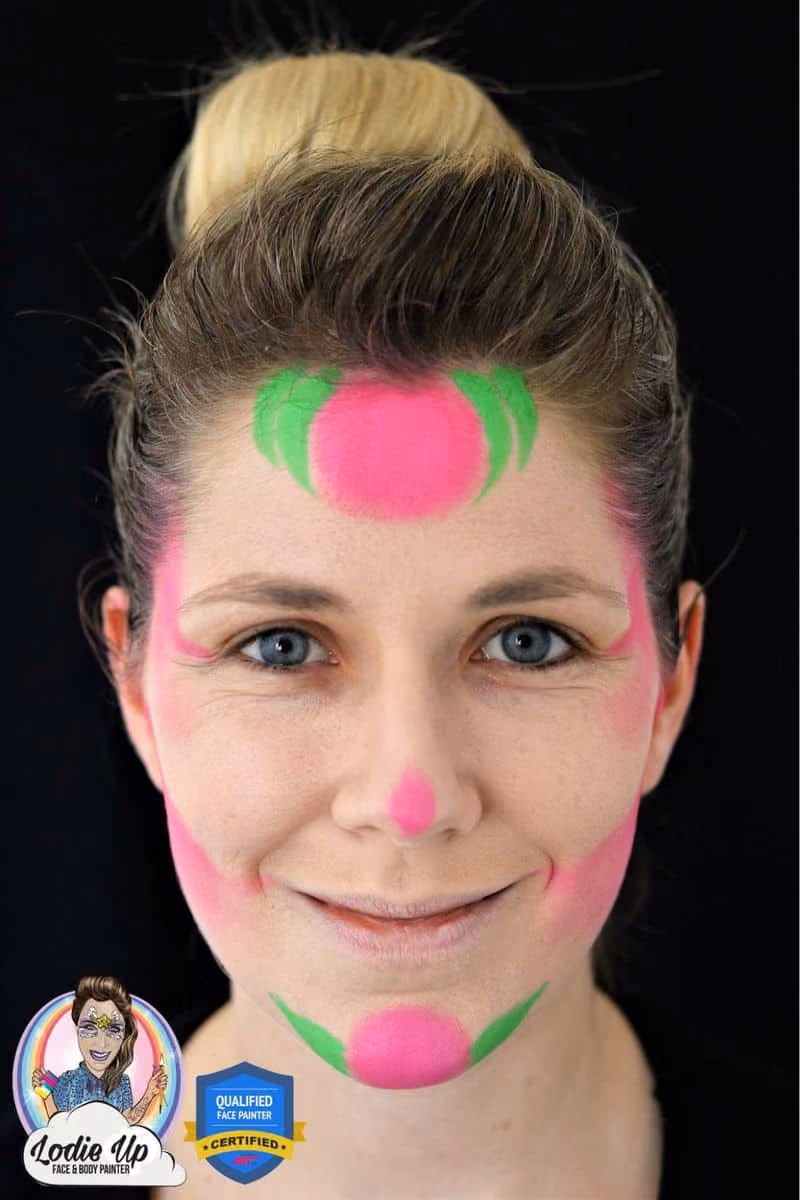 a woman looking at the camera with a sugar skull face paint base on her face