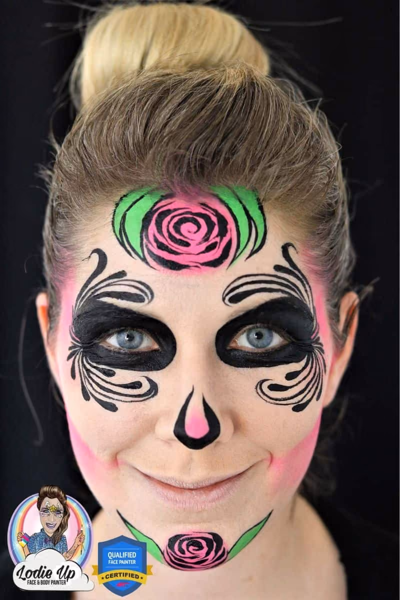 a woman with an unfinished sugar skull face paint design