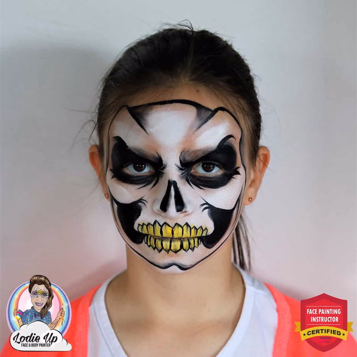 a girl with a skeleton face painting now with added outlines of the skull, eyes and teeth
