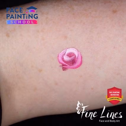 miniature minimalistic rose done in four strokes of a face painting brush