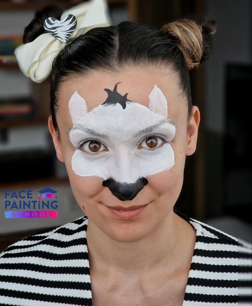 a woman with a conture of a zebra face paint design now with illustrated nose and hair