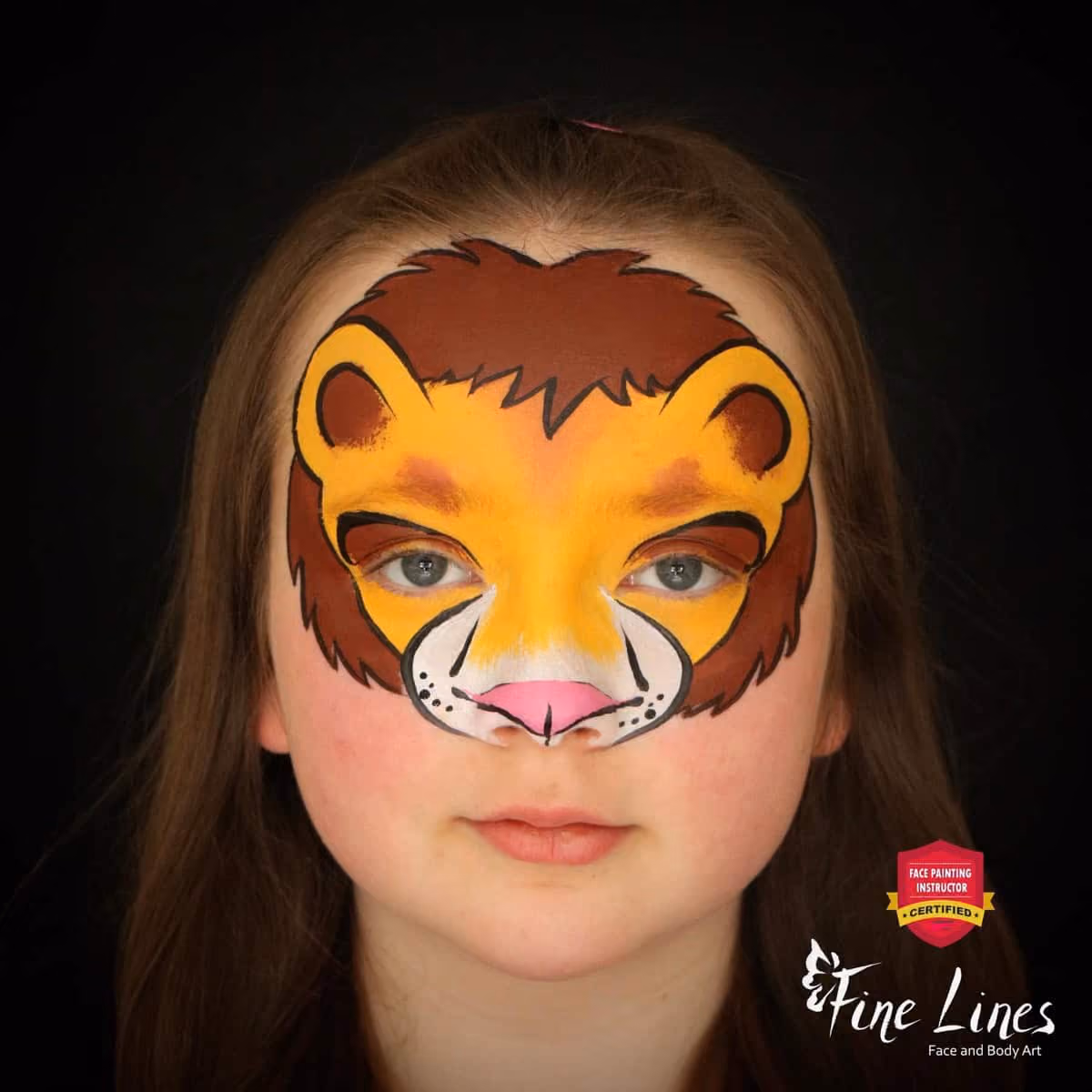 a girl with an outlined base of a lion face paint design on her face