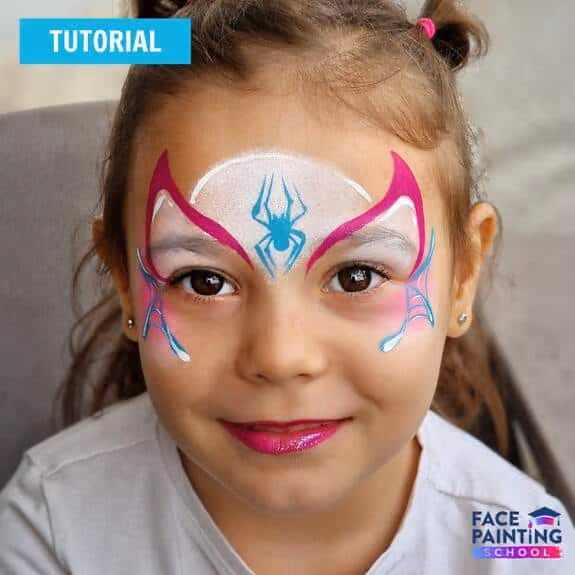 an image of a girl with a ghost spider face paint design