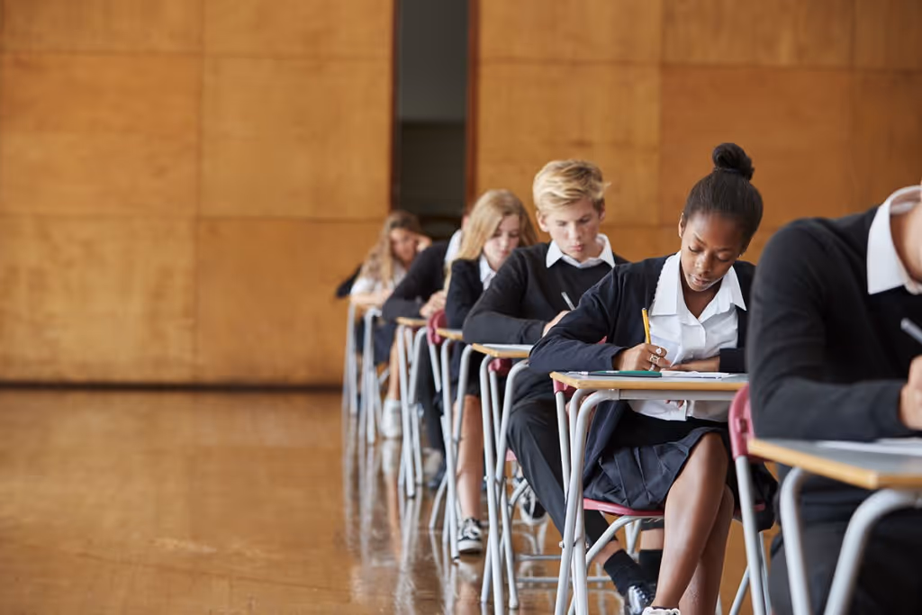 students in school taking a test