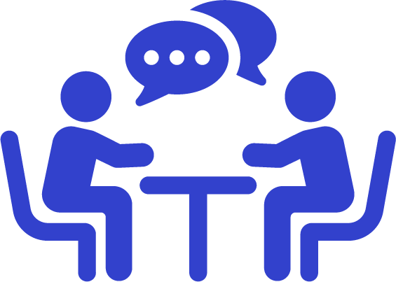 Two people sitting at a table having a conversation represented by speech bubbles.