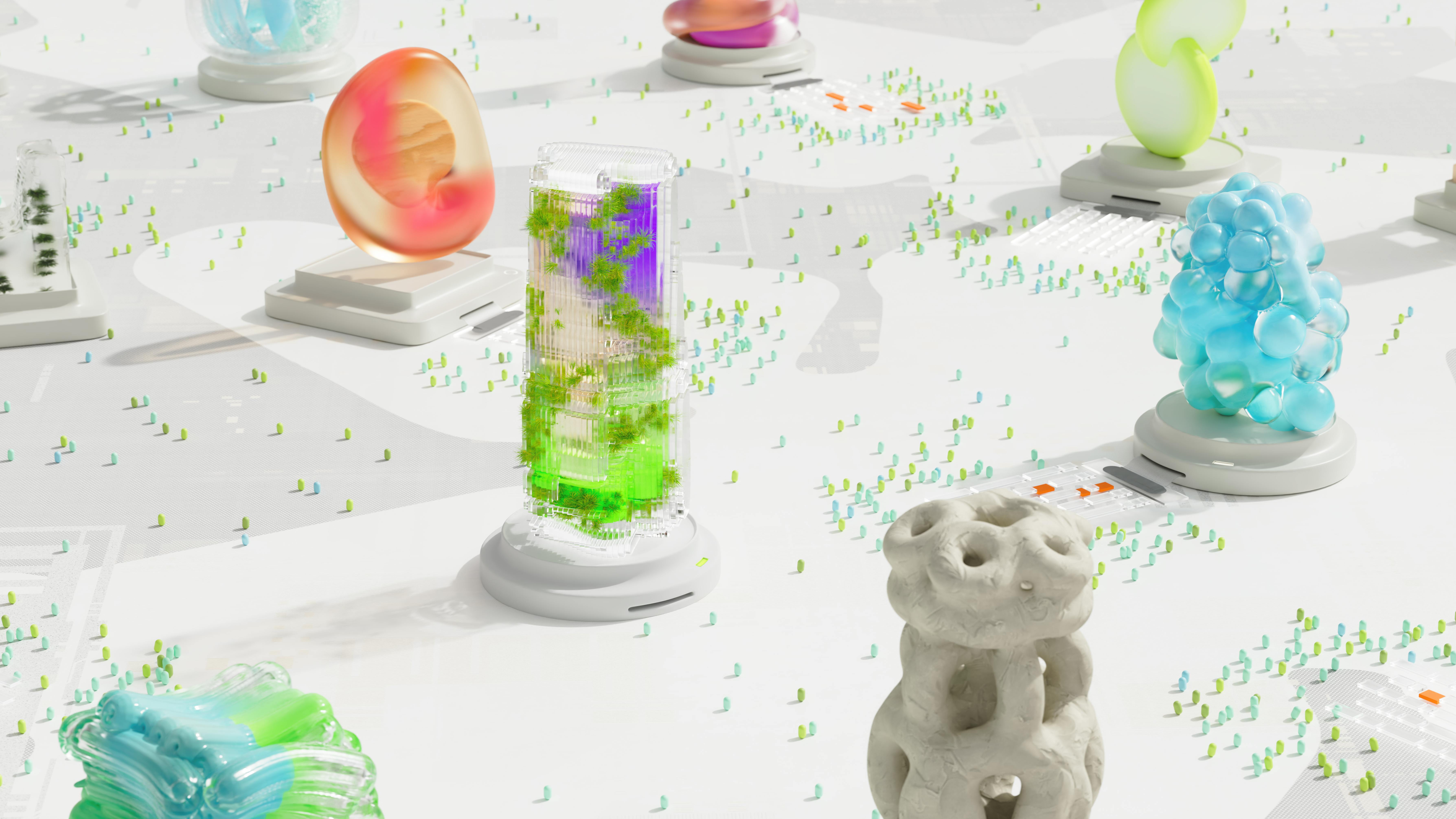Futuristic translucent sculptures with organic shapes and green plant-like details placed on a white surface with scattered tiny colorful dots.