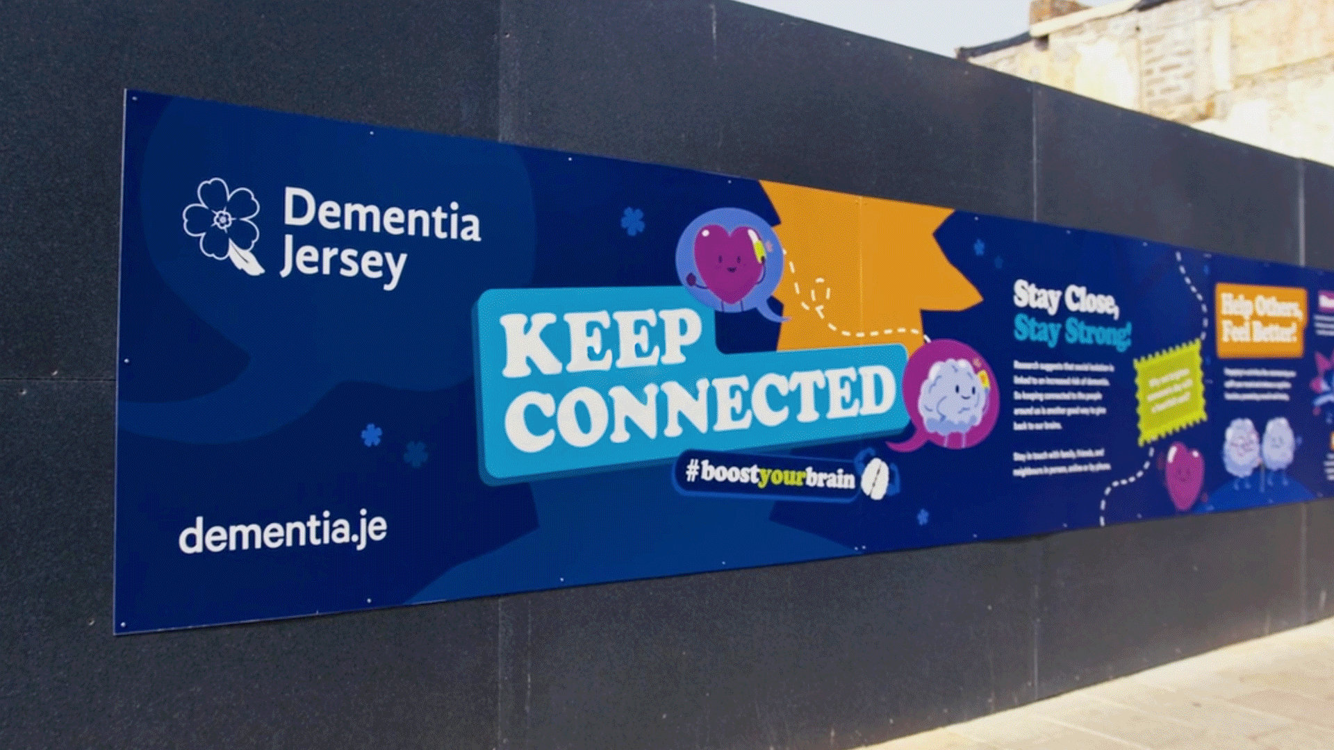 Outdoor banner for Dementia Jersey with a message to keep connected and support brain health.