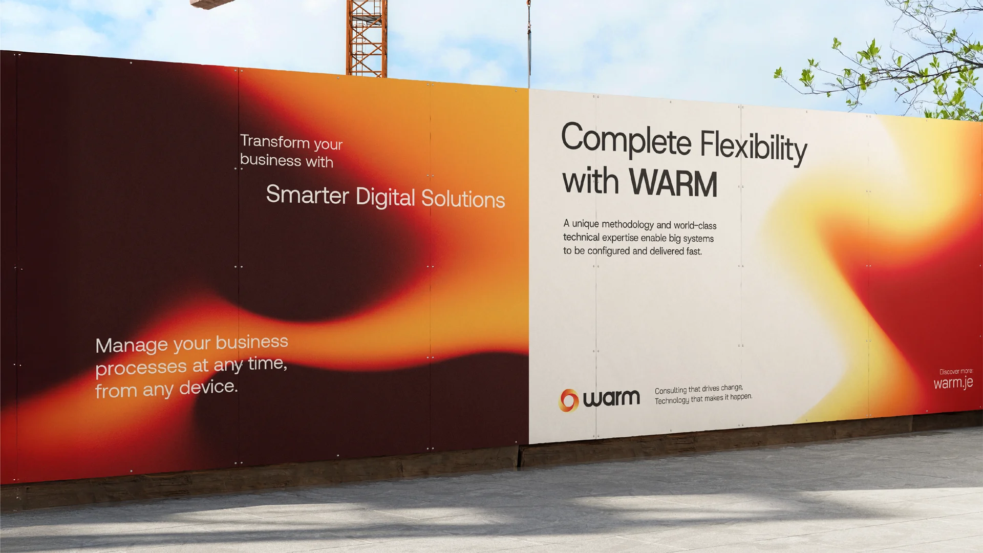 Outdoor advertisement with text promoting smarter digital solutions and complete flexibility with WARM, set against an abstract warm color background.