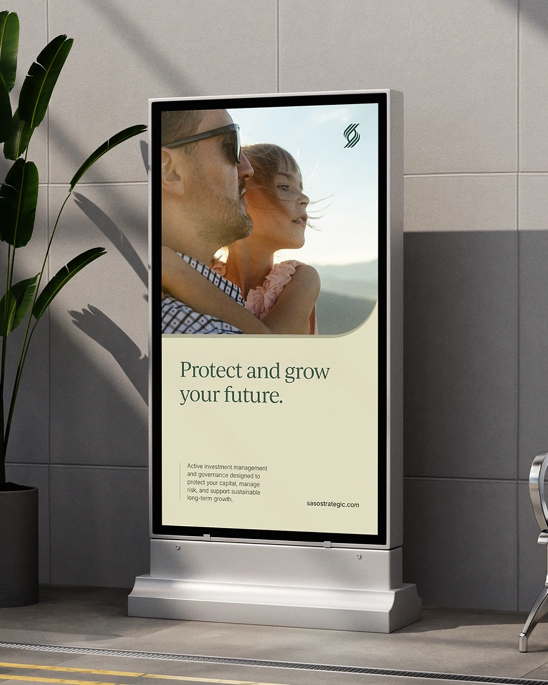 Billboard featuring a close-up photo of a man wearing sunglasses holding a young girl in a pink dress, with the text 'Protect and grow your future.' below and a brief message about active investment management and governance at the bottom.