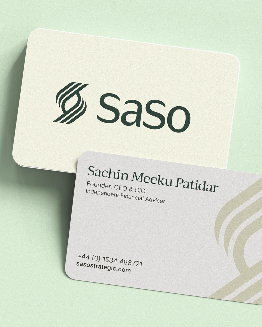 Two business cards for SaSo on a light green surface; the top card shows the SaSo logo and name, the bottom card displays contact details for Sachin Meeku Patidar, Founder, CEO & CIO, Independent Financial Adviser, with a phone number and website sasostrategic.com.