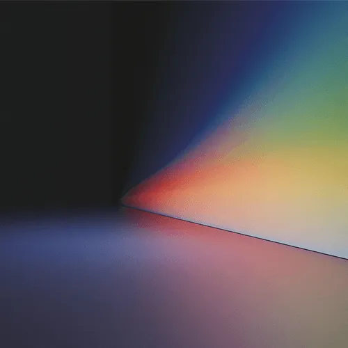 A black and white photo with a rainbow colored background.