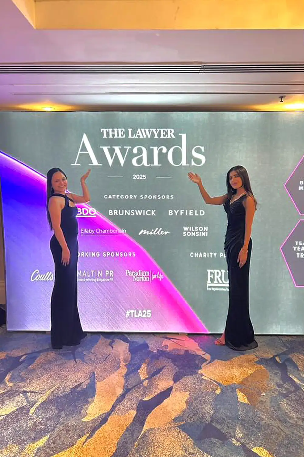 Mary Decolongon and Mahira Nasir of One Essex Court at the Lawyer Awards 2025, celebrating their 'Chambers of the Year' award.