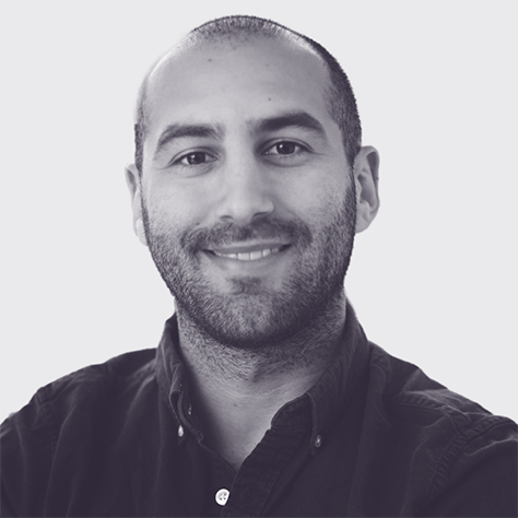 Black and white headshot of Max Coonin.