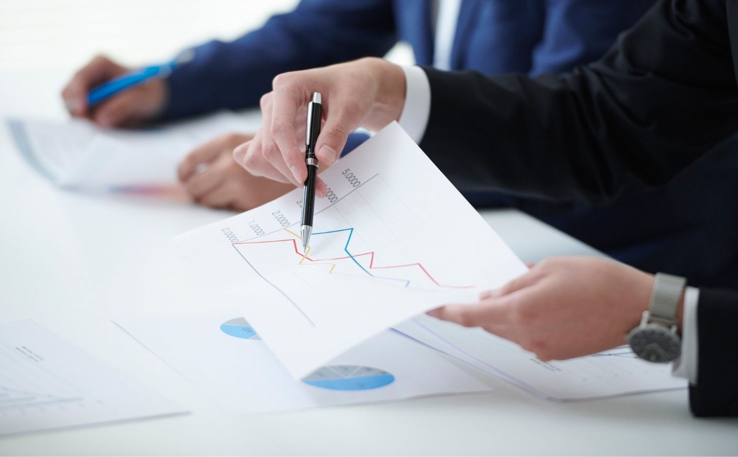 image of business person looking at resource statistics