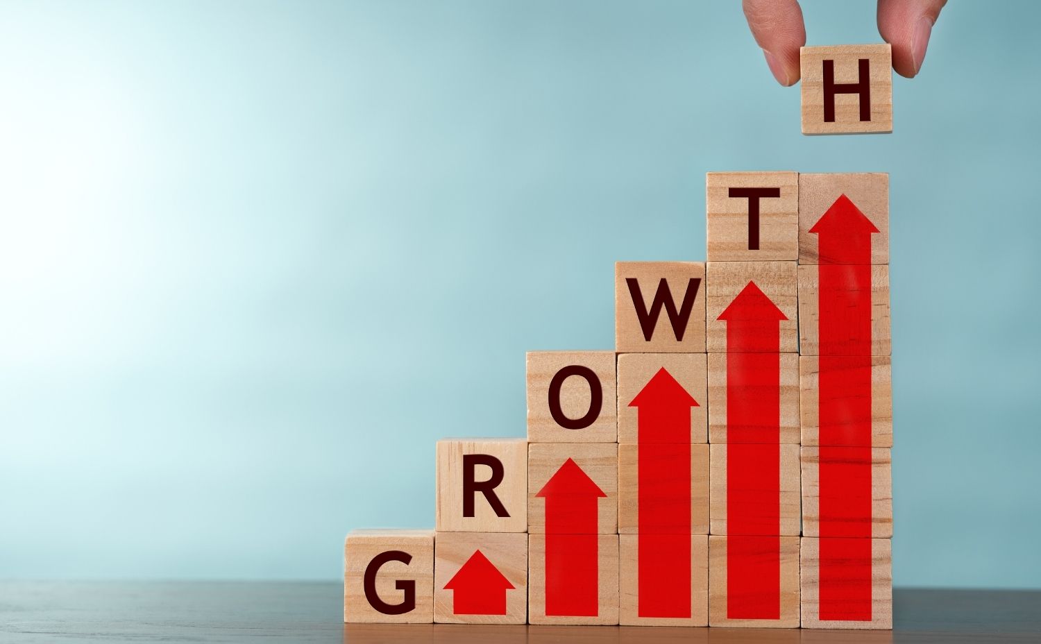 Image of building blocks spelling the word growth
