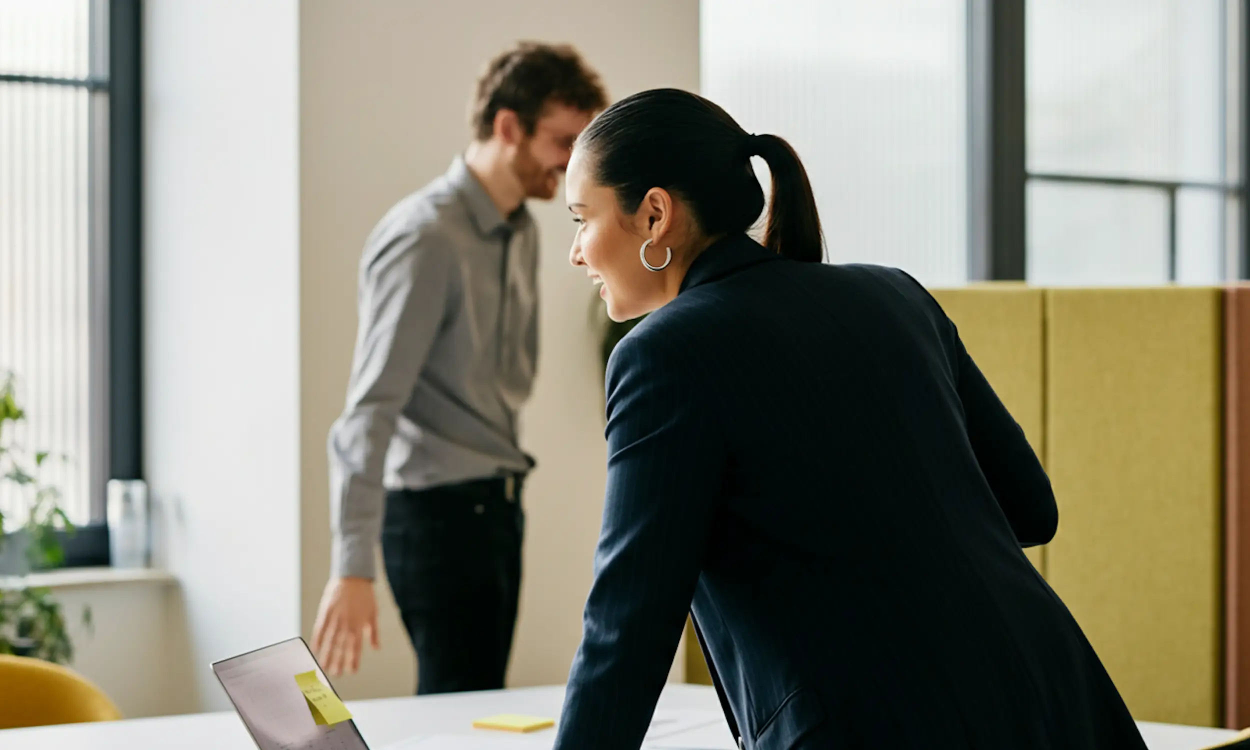 Woman standing in conference room