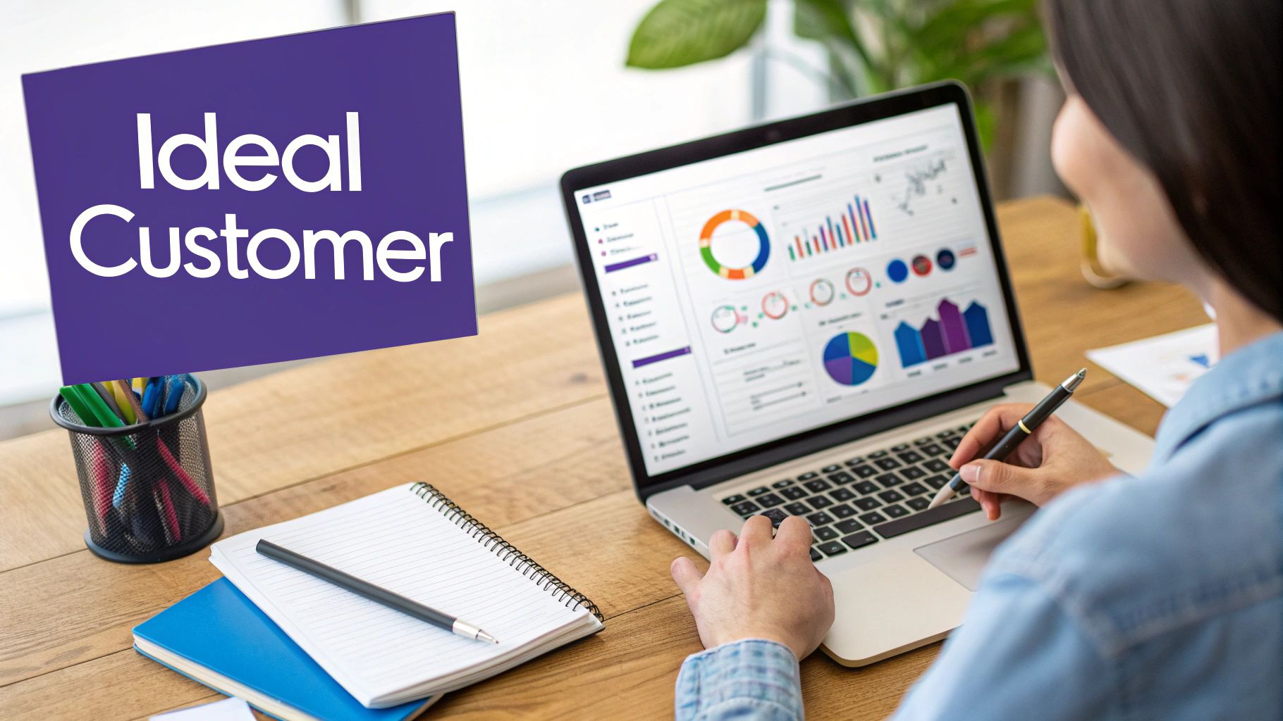 A person using a magnifying glass to examine a detailed customer profile chart, symbolizing the focus on defining an ideal customer.