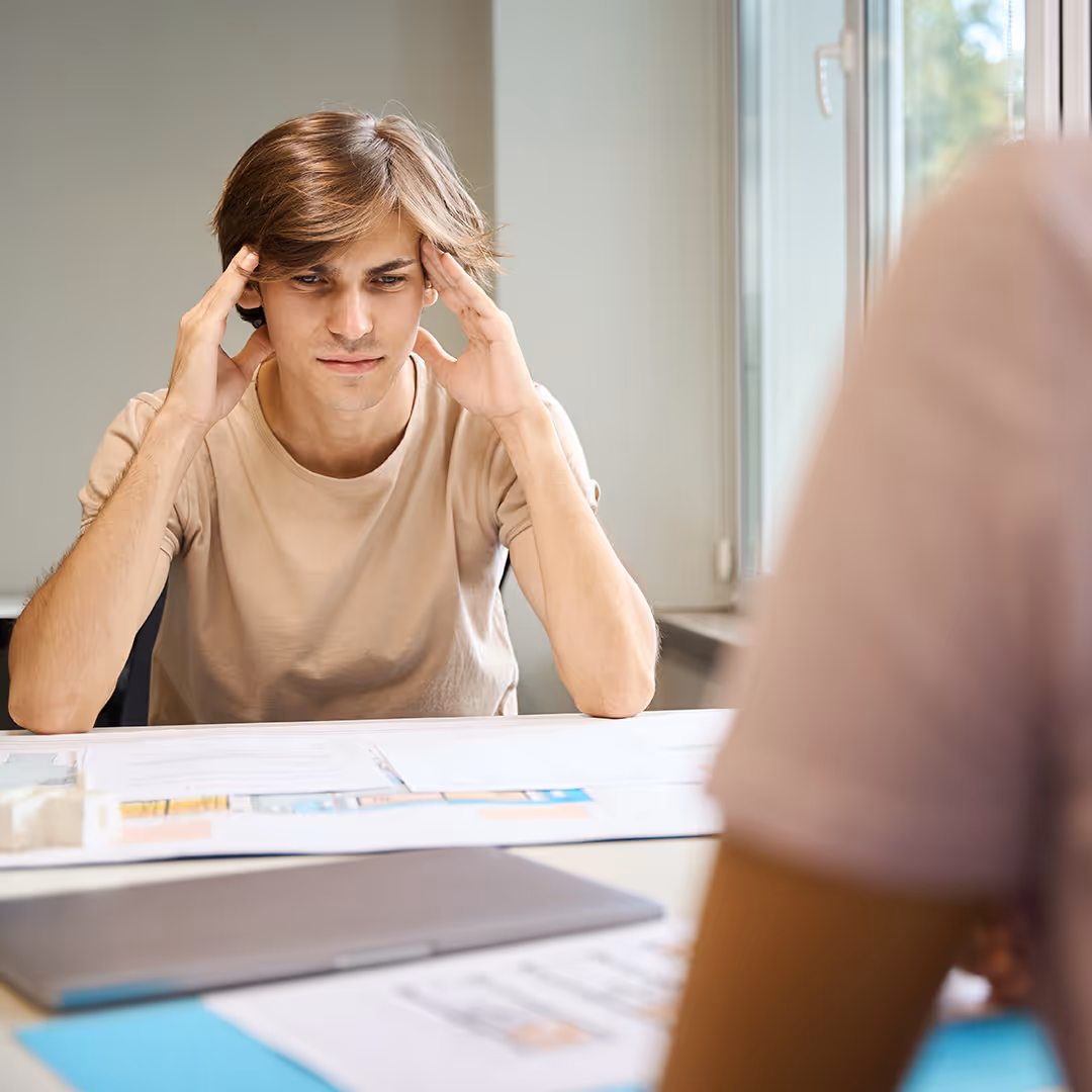 Young male struggling to cope with OCD. OCD therapy and treatment at Hope Speaks in Richardson TX