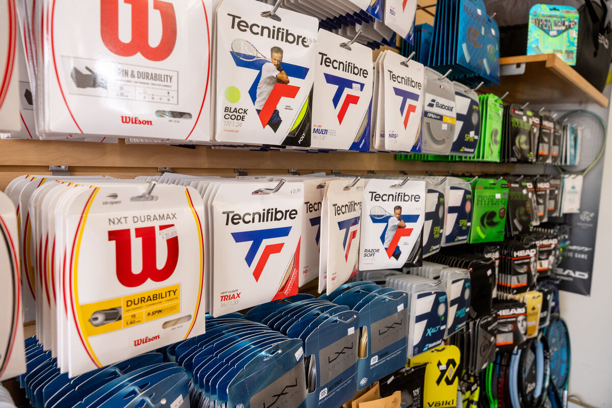 A store display of different kinds of tennis accesories.
