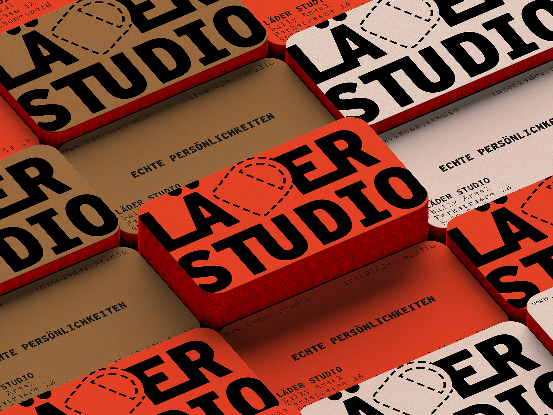 Business cards for Läder Studio featuring bold typography, clean color variations, and distinctive brand elements.