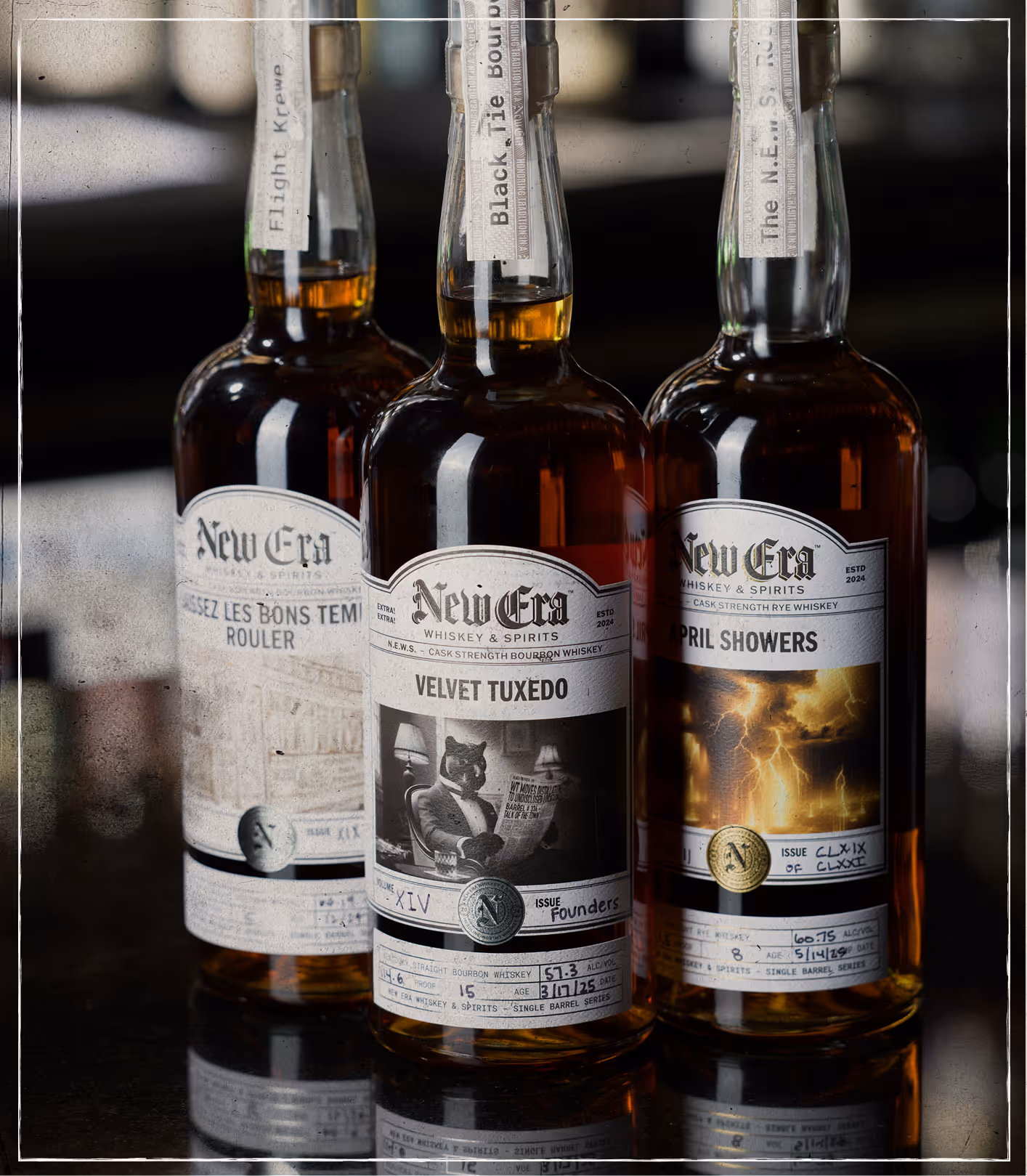 A photo of three bottles of various New Era bourbon releases