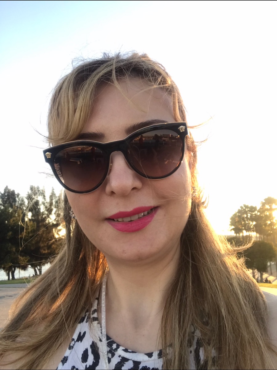 Ryma smiling outdoors