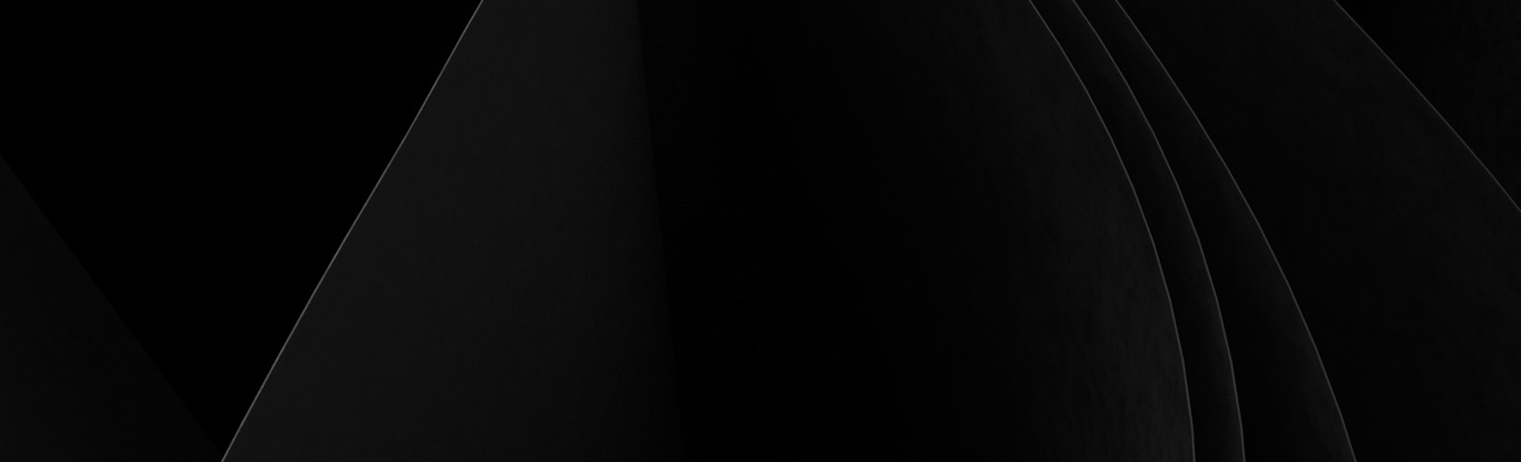 Abstract dark black geometric shapes with sharp angles and curved lines creating a layered effect.