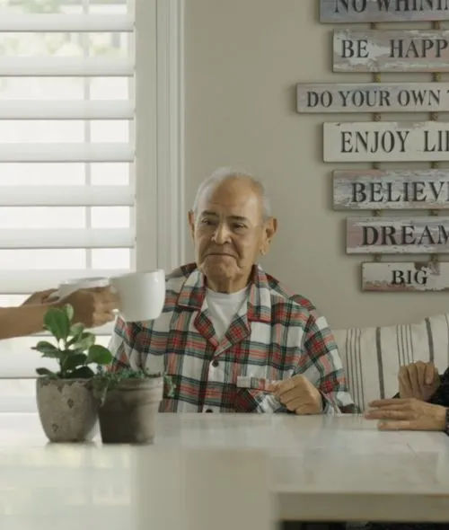 Man getting served by caregiver