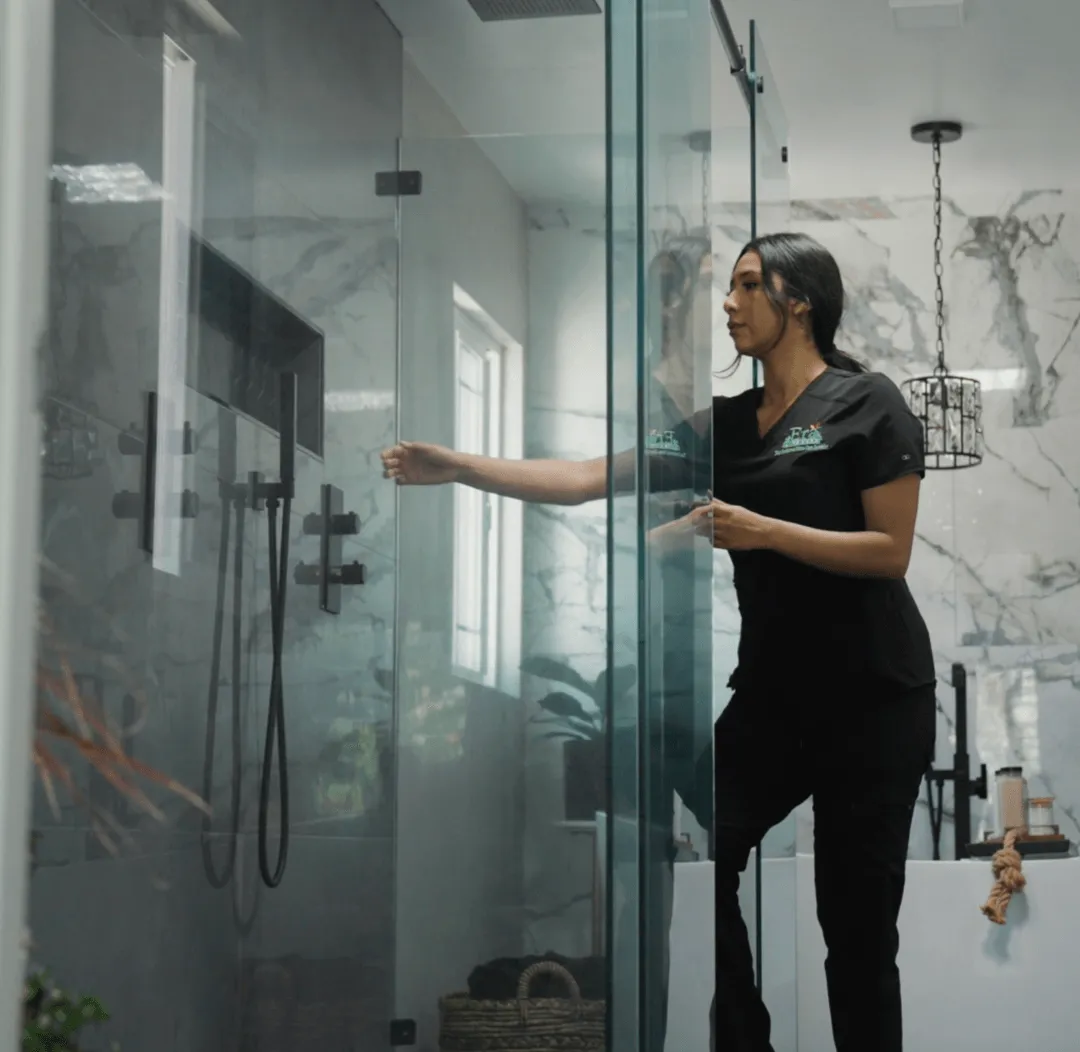 Era Life Care caregiver turning on the shower