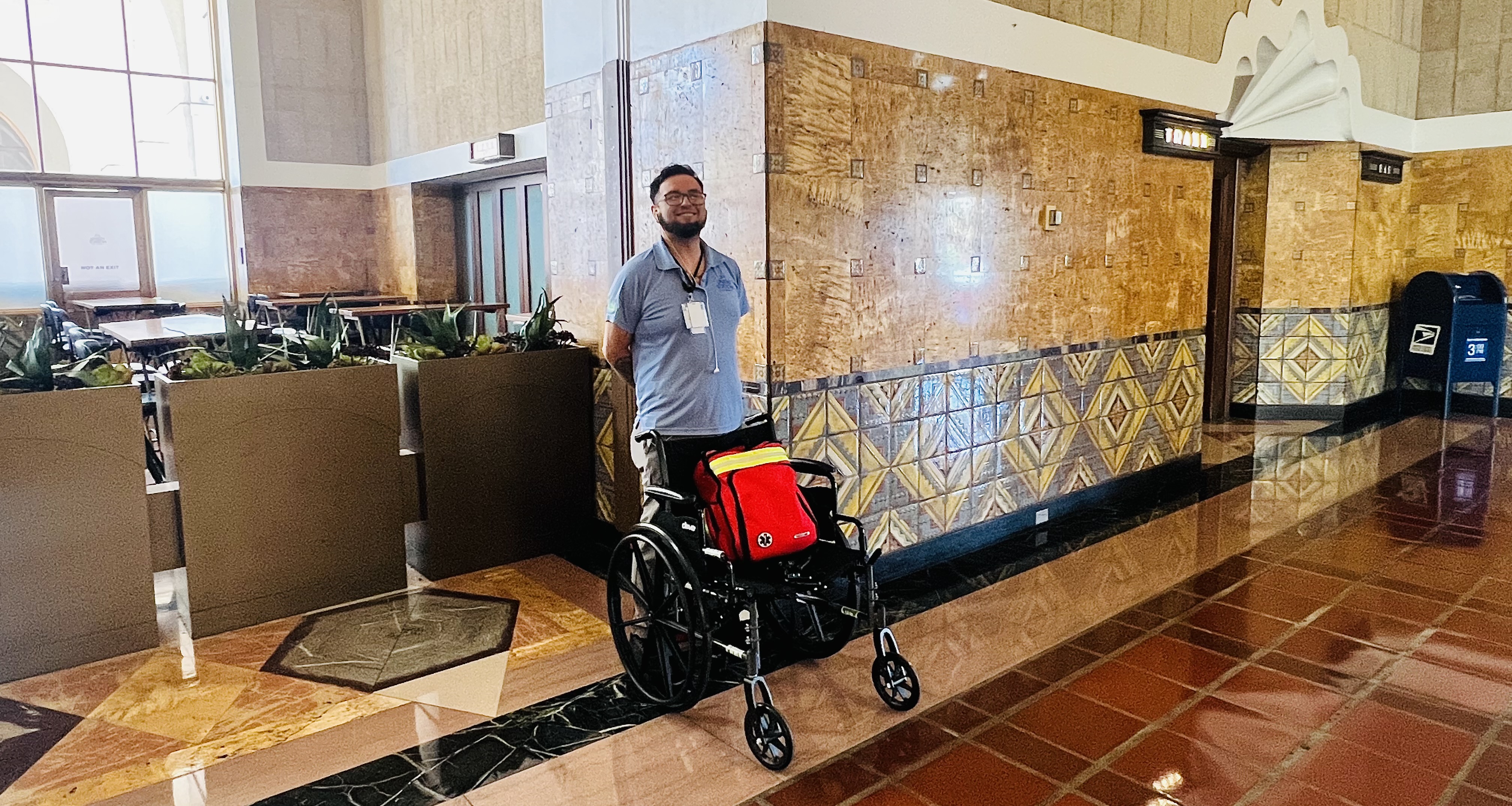 Mobility services worker standing inside union station
