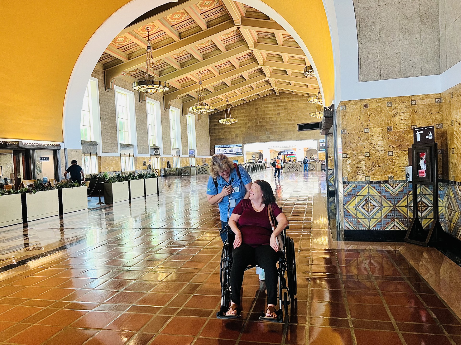 Mobility services worker standing inside union station