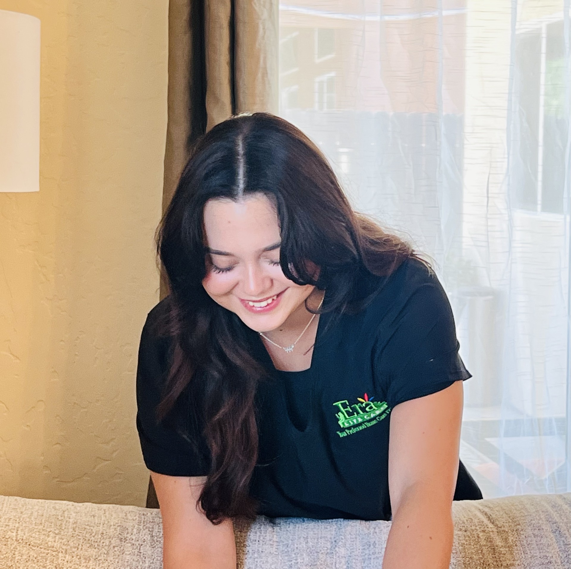 Era Life Care caregiver turning on the shower
