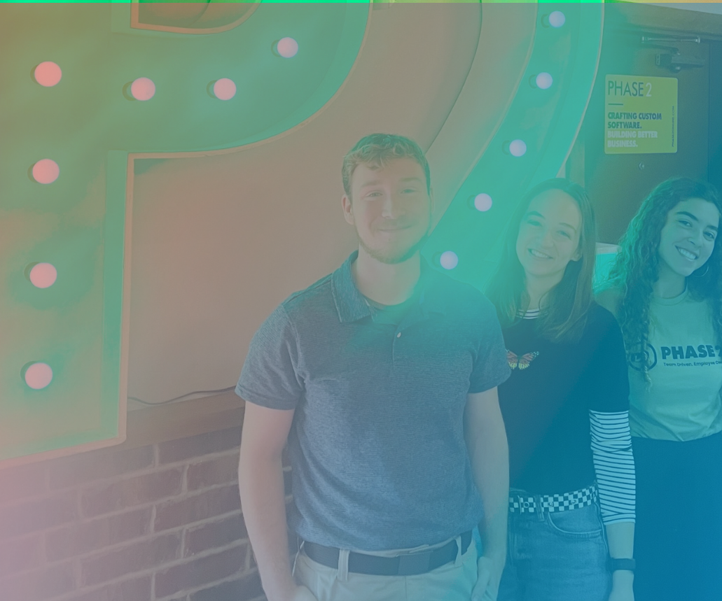 Three smiling people standing together in modern tech office with turquoise overlay and decorative circles.