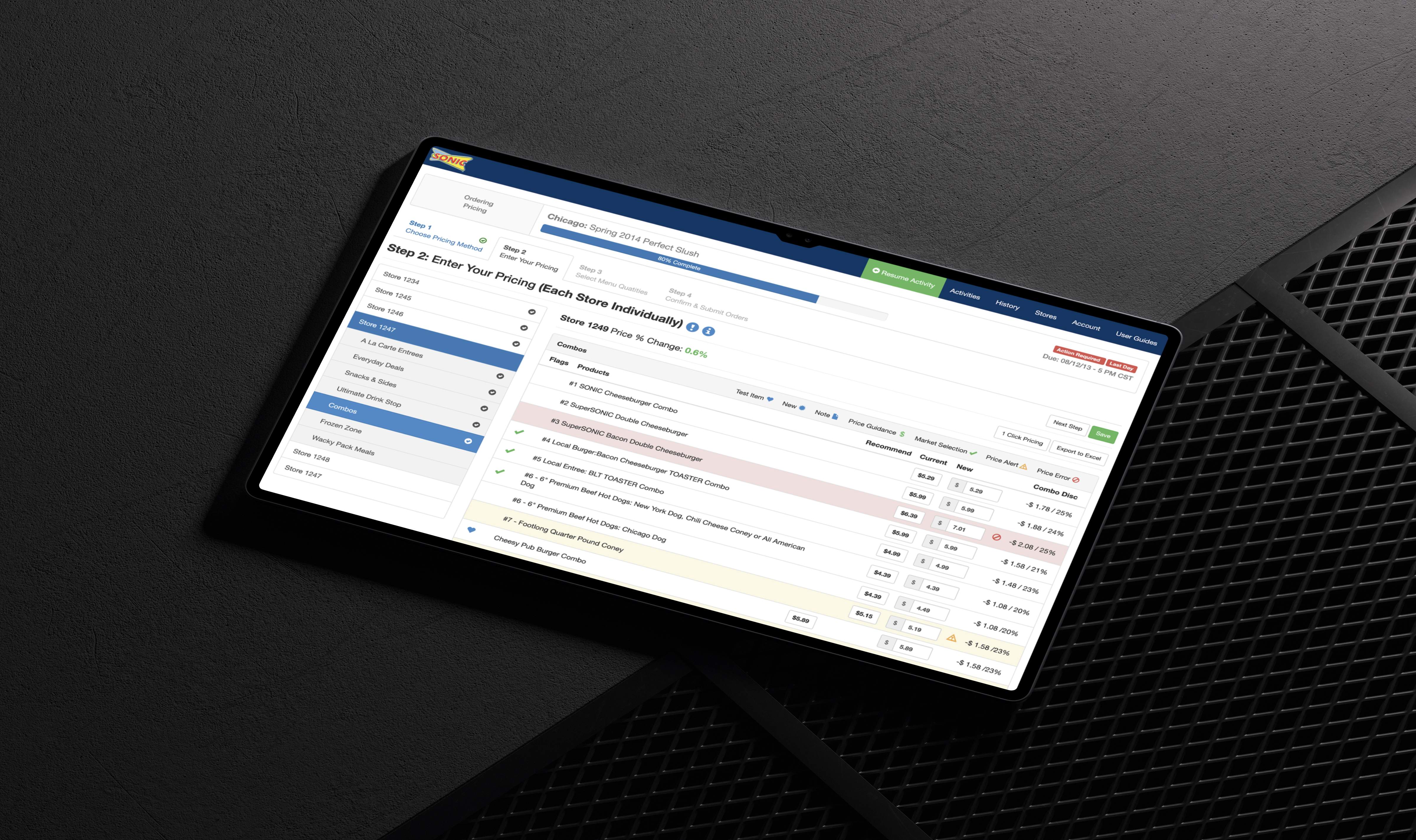 Tablet displaying pricing management interface with store-specific data and product pricing information.
