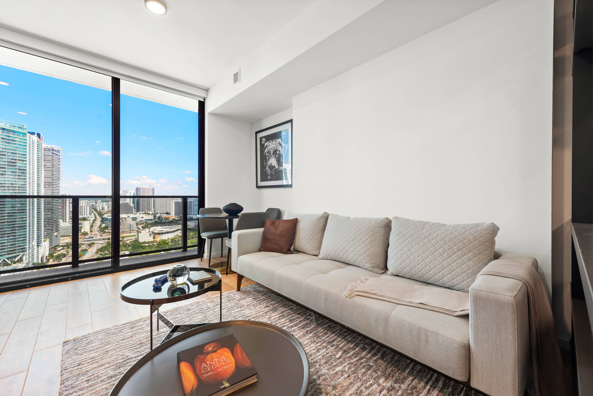 elegant hotel room with view of miami