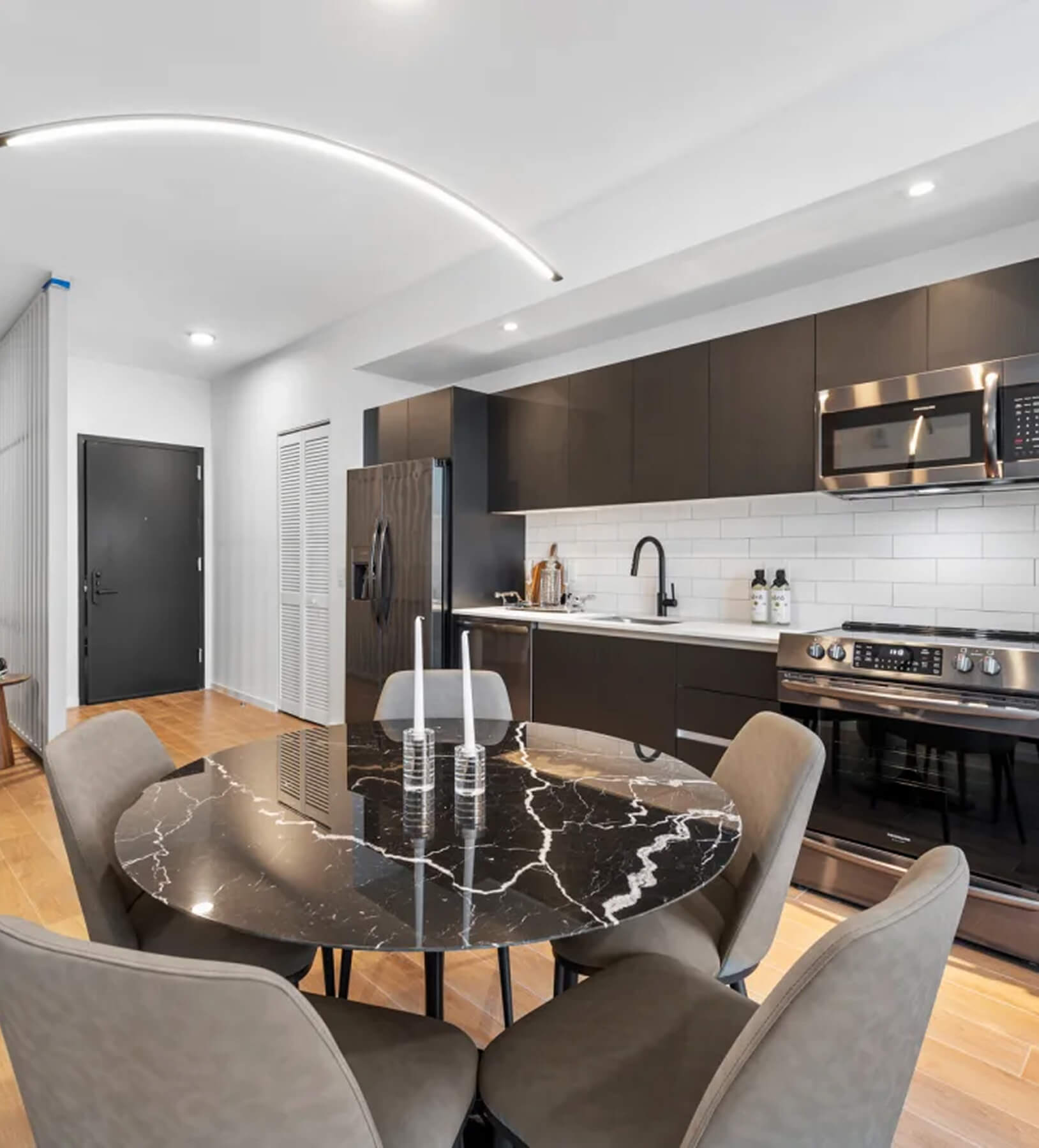 elegant hotel room with complete kitchen