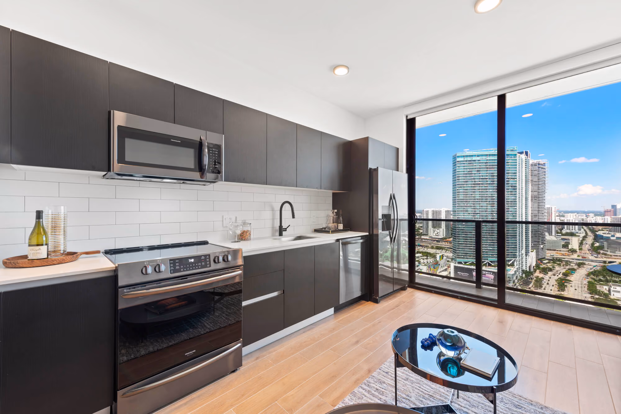high end residential kitchen with view of miami