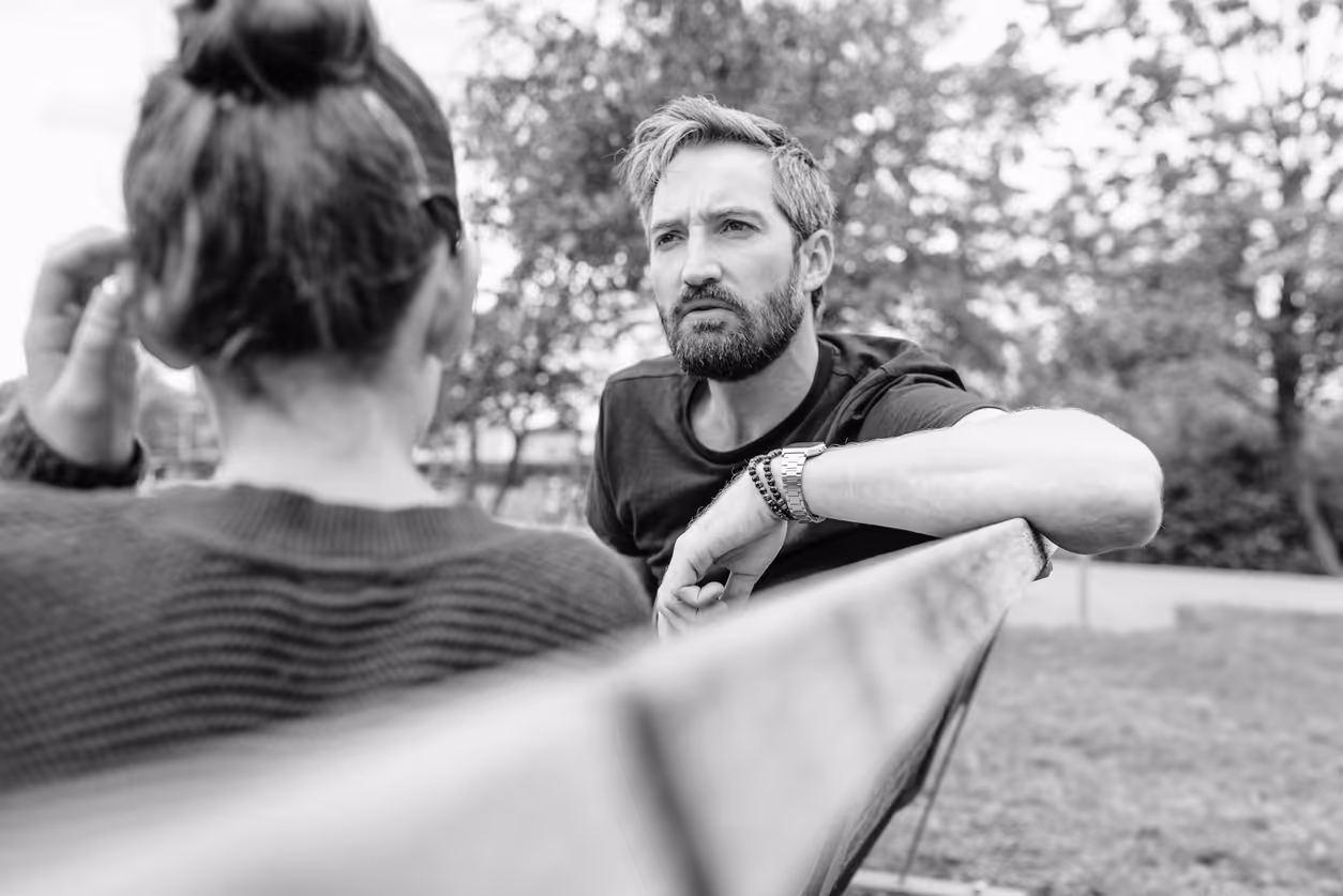 Therapy for therapists image of two adults seated outdoors