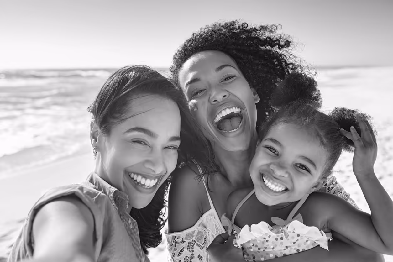 Supporting your transgender child with parent coaching image of a parent and two kids