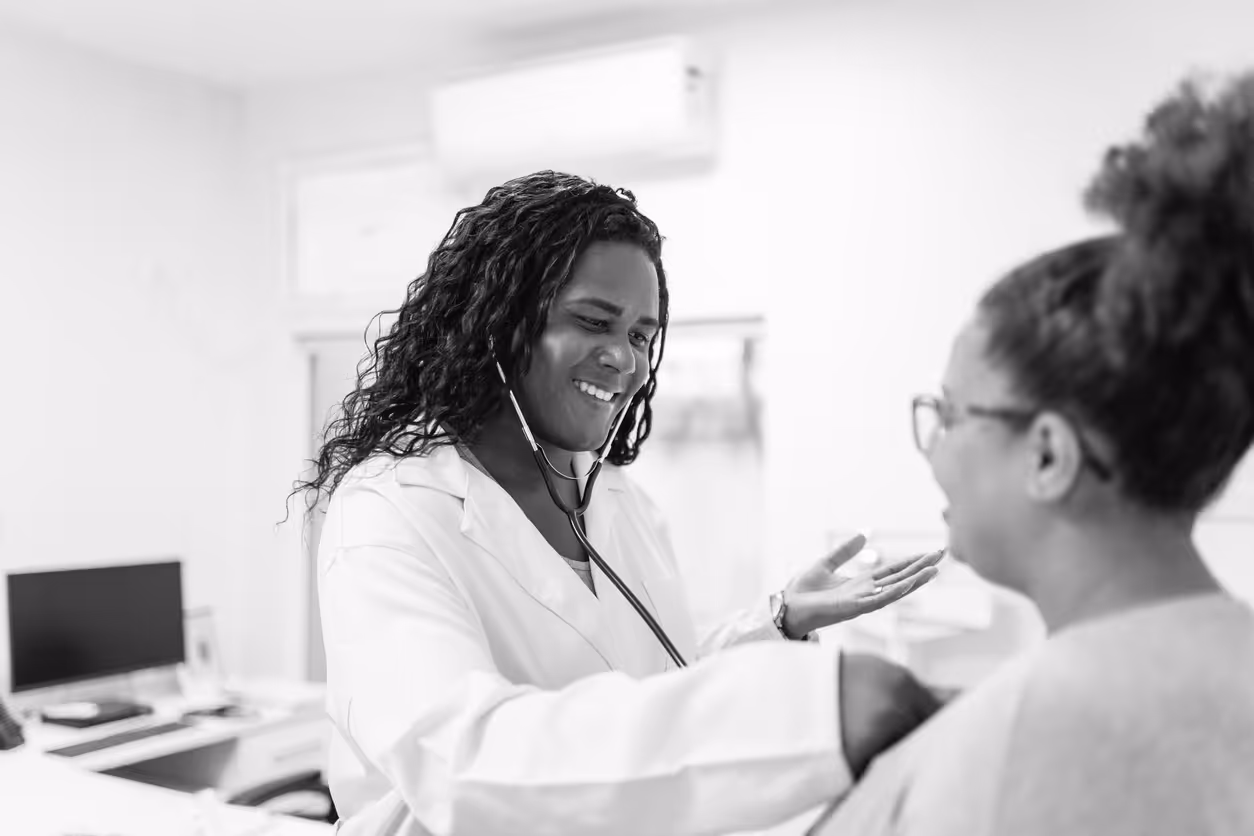 Trans woman doctor attending to a patient