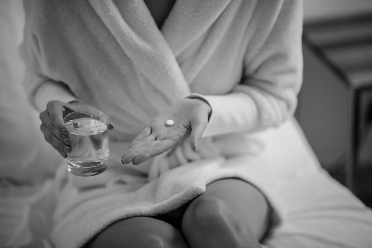 Gender-affirming hormone therapy in BC image of a person holding medicine