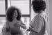Nurse examining transgender woman at home