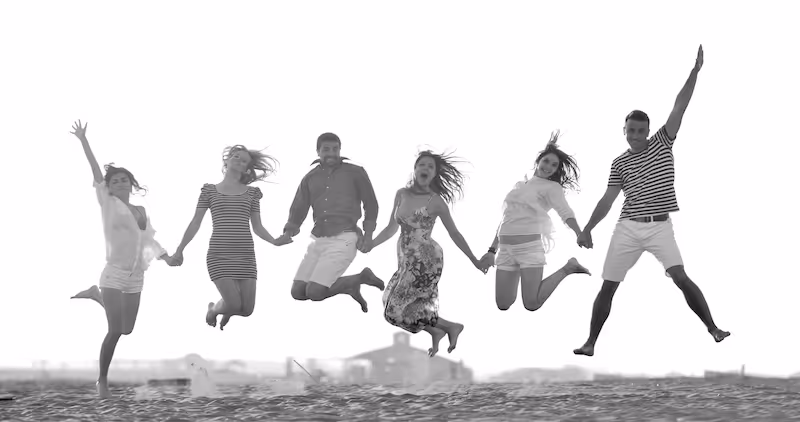 Relationship Therapy Image with Group Jumping into the Air